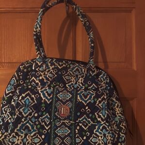 Vera Bradley Purse with turnbuckle lock on front side pocket